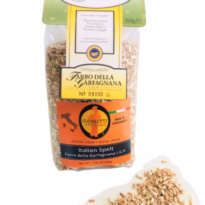 A 1lb bag of Giannetti Artisans pearled italian farro with farro grains next to the bag on a white background