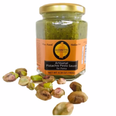 One 7 oz  jar of Giannetti Artisans pistachio pesto sauce on white background