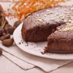 Close up of a cut chocolate cake to demonstrate the outcome of Giannetti Artisans Chocolate Chestnut Flour Cake Recipe