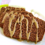 Side view of a plum cake to show outcome of the Giannetti Artisans Gluten Free Yogurt & Chestnut Coffee Cake Recipe