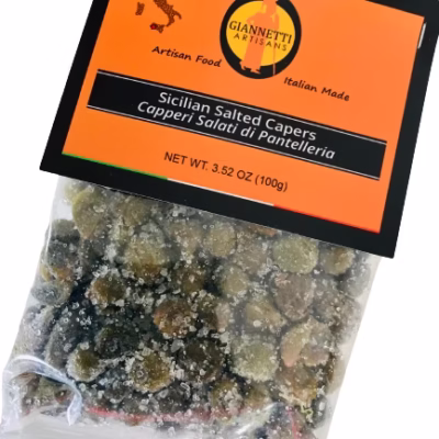 Overhead view of Giannetti Artisans Pantelleria salted capers in a small product bag