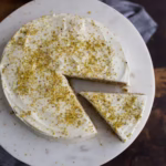 Top view of a cake displaying the outcome of Giannetti Artisans Sicilian Pistachio Olive Oil Cake Recipe