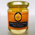 A photo of an 8.8 oz jar of Unpasteurized Acacia Honey for sale on Giannetti Artisans.