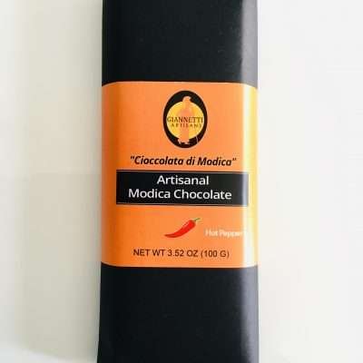 A photo of a chocolate candy bar of Handmade Modica chocolate from Sicily made with hot pepper