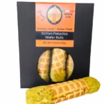 Giannetti Artisans Sicilian Pistachio Rolls in black packaging with an individual roll in front, showcasing the pistachio-filled ends.