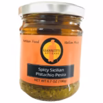 A jar of Giannetti Artisans Spicy Pistachio Pesto on a white background